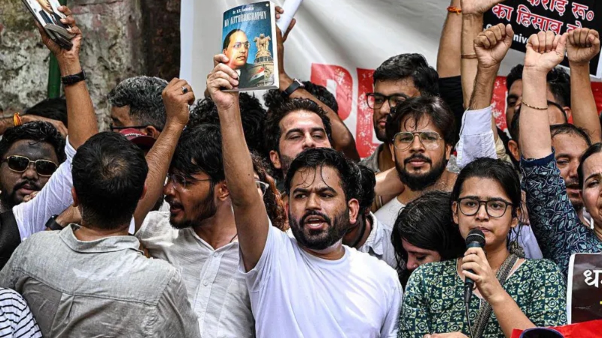 Abhijeet Dipke, founder of the Cockroach Janta Party, speaks during a protest in Delhi