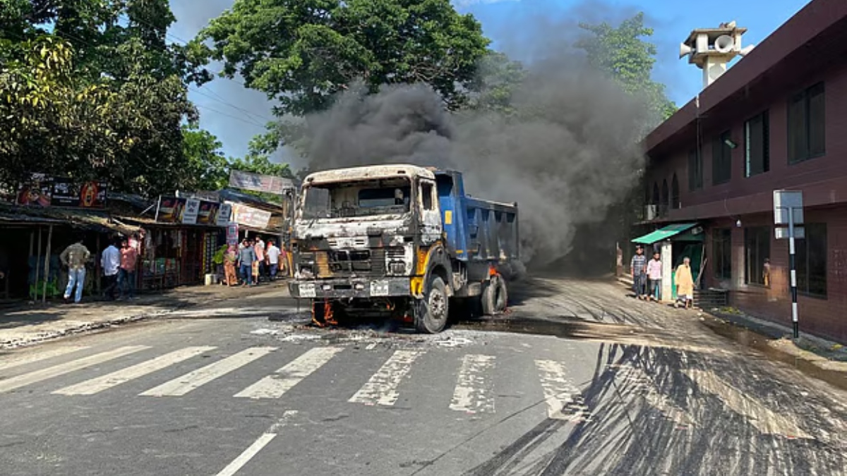 Crowd burns two trucks after a fatal road accident in Rajshahi