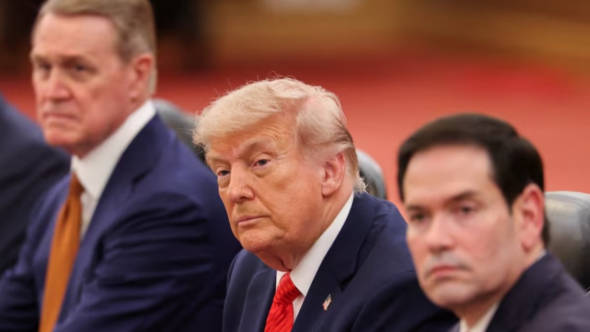 Donald Trump attends a meeting with Xi Jinping in Beijing