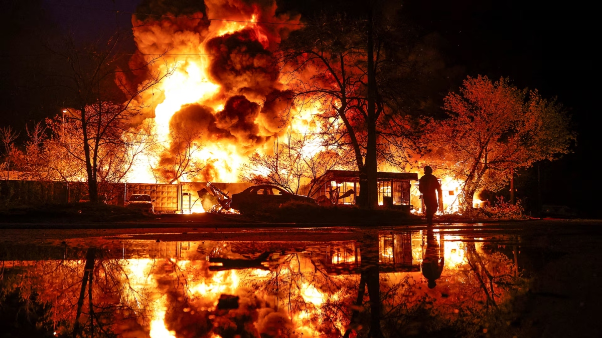 Firefighter at a Kyiv warehouse hit by a Russian missile strike