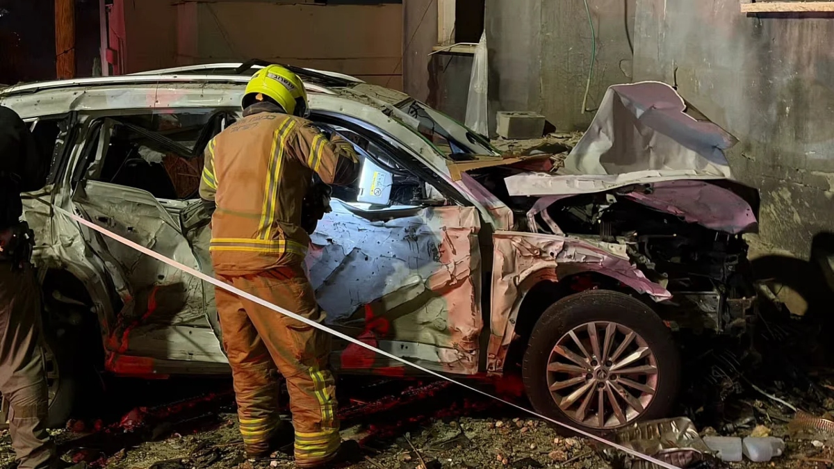 Firefighters-work-amid-the-rubble-after-a-missile-strike-hit-the-city-of-Jarjir-in-Israel