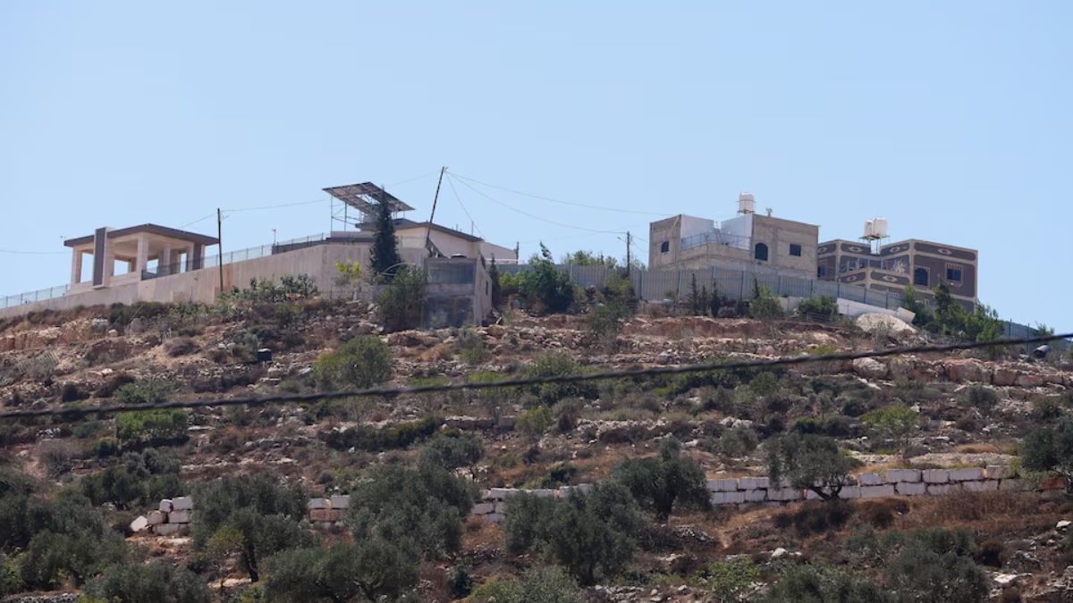 Israel sends troops into West Bank homes besieged by Jewish settlers