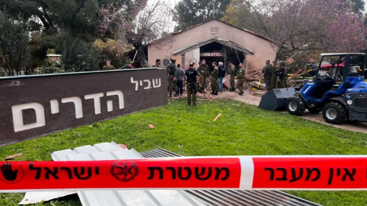 Israeli-rescue-teams-work-beside-damaged-buildings-after-Hezbollah-attacks-in-Israel