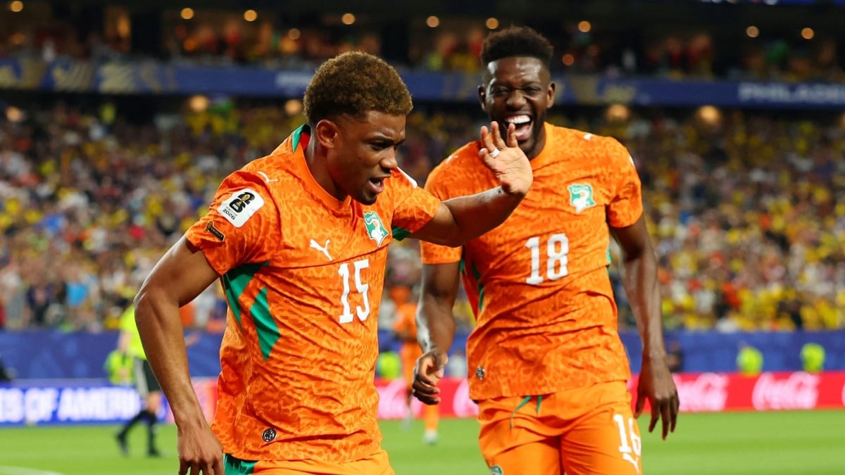 Ivory Coast's Amad Diallo celebrates with Ibrahim Sangare after scoring their all-important goal