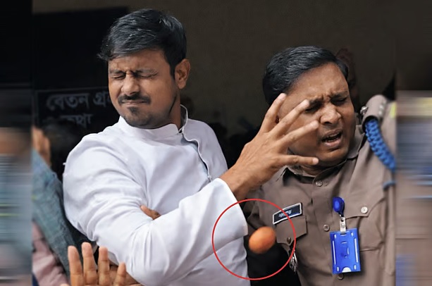 ঢাকা-৮ আসনের প্রার্থী নাসীরুদ্দীন পাটওয়ারীর ওপর ডিম নিক্ষেপ