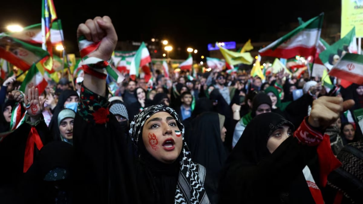 People chant during a rally in Tehran, Iran, May 6, 2026